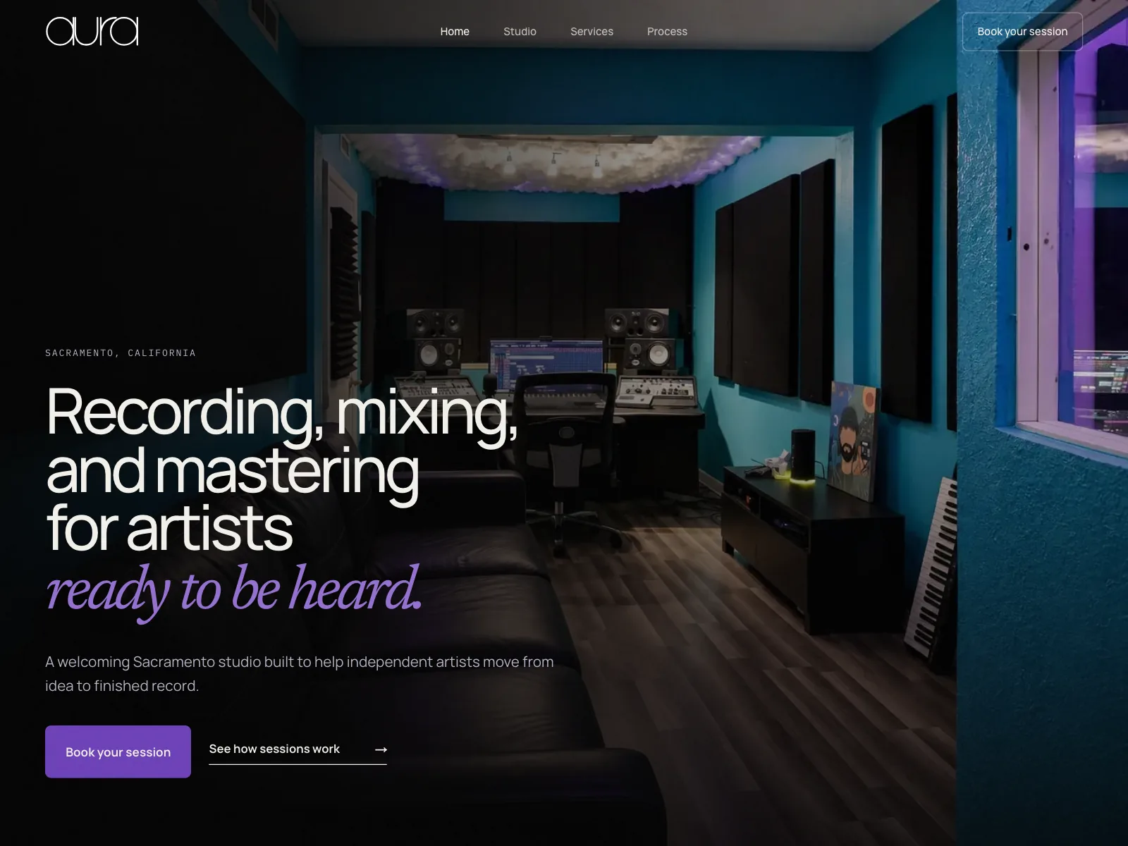 The Aura Studios website: “Recording, mixing, and mastering for artists ready to be heard,” over a photo of a blue-lit live room.